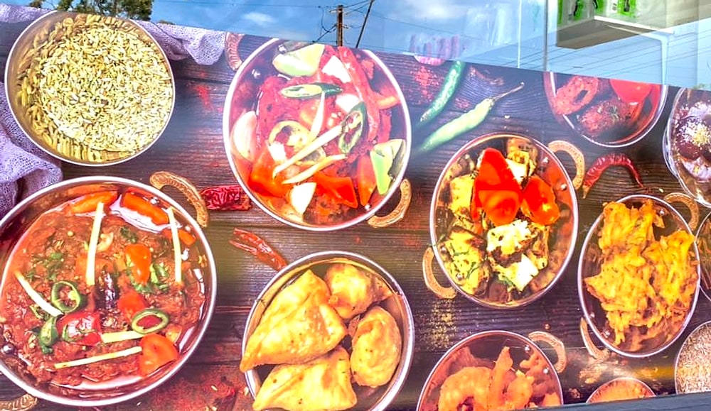 Mother India Kitchen shopfront window on Port Road
